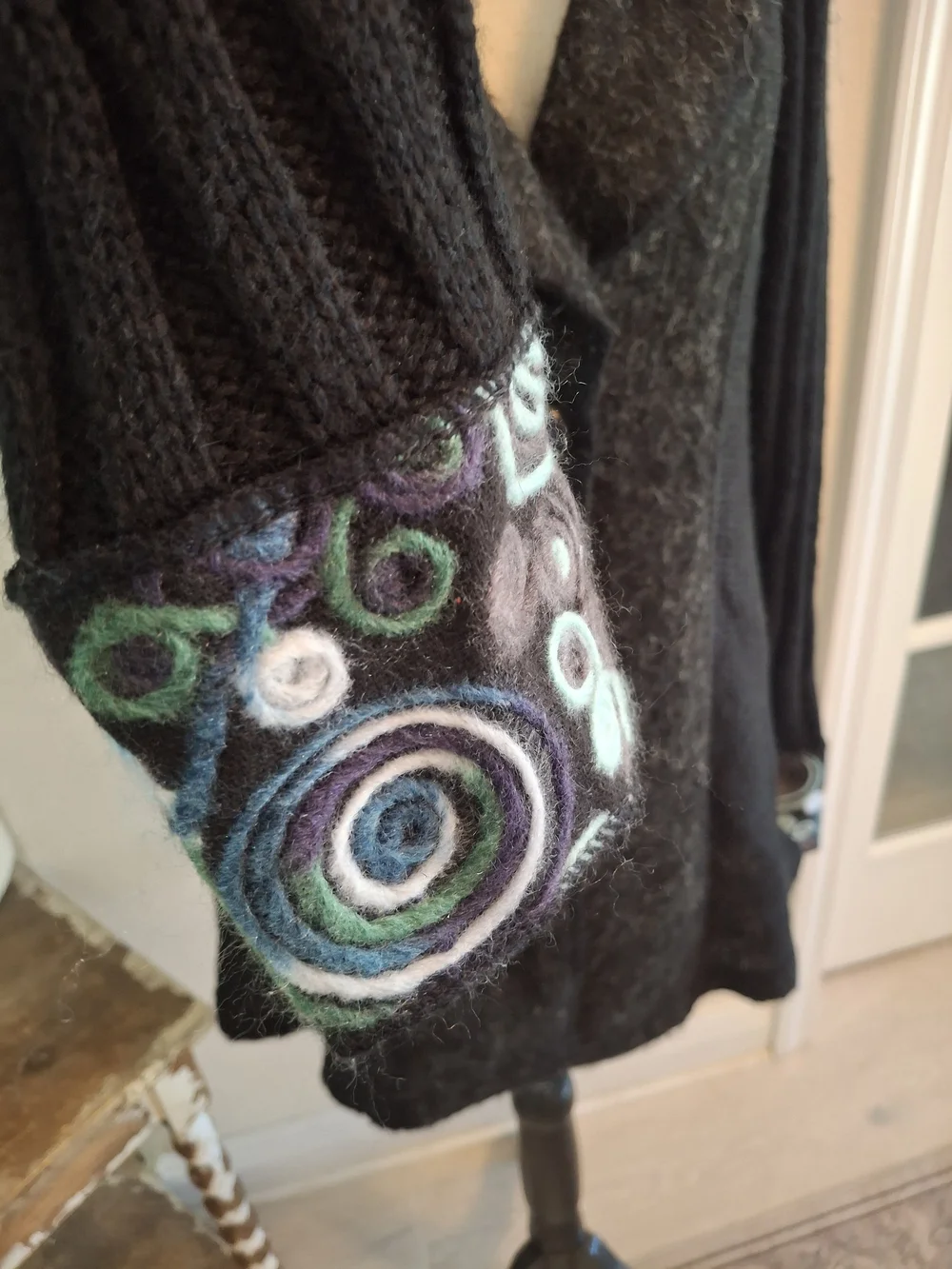 Sioni Black Knit Cardigan with Printed Collar and Cuff Accents